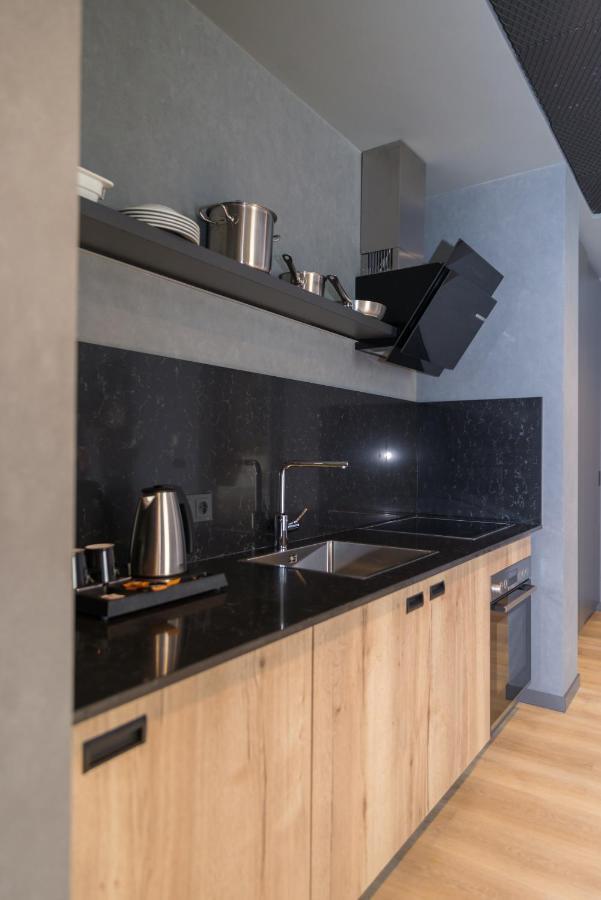 Mk Hotel Tirana Rinas Exteriér fotografie A kitchen in a serviced apartment in Paris